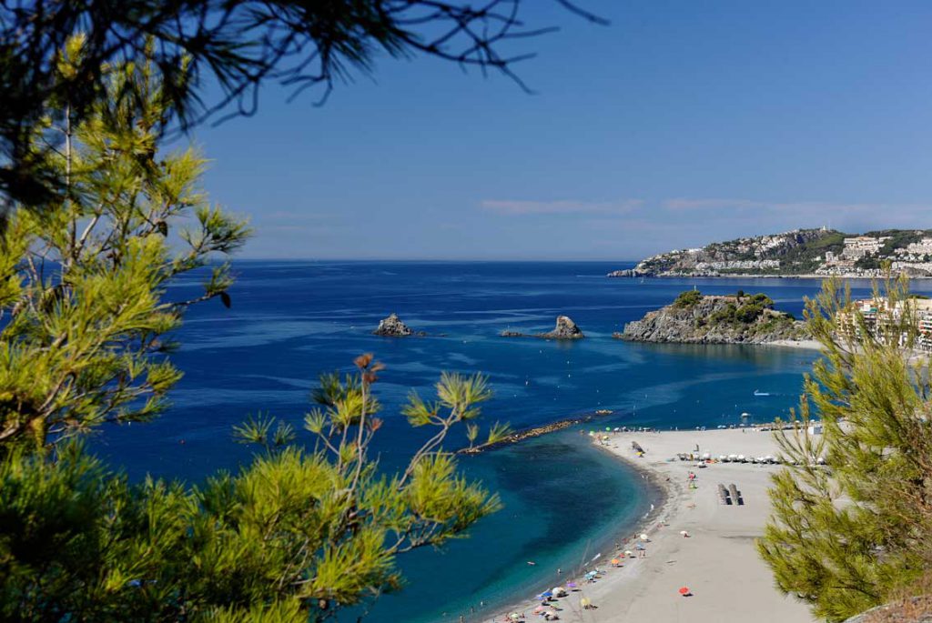 Blue Costa Tropical bay and beach